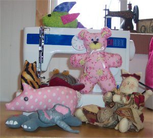 A group of handmade stuffed animals you can sew at summer sewing camp.