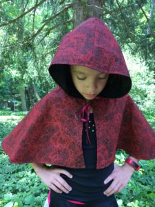 handmade little red ridding hood cape, sewn by a child