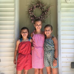 3 rompers made by young sewing students