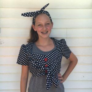 young fashion designer blue white polka dot crop top