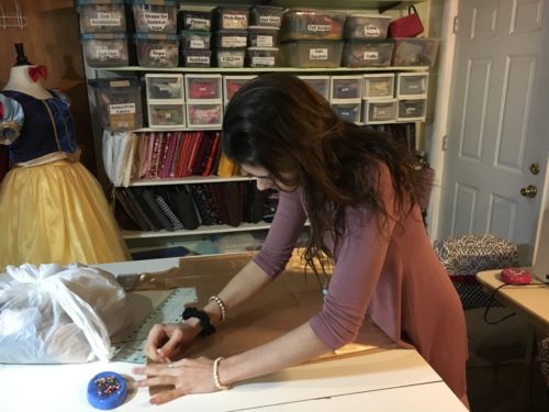 Sarah prepping her gold fabric to make her own prom dress.