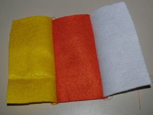 A Halloween, handmade, and easy to sew candy corn drawstring bag