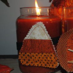 A candy corn candle ring the is a Halloween craft, easy to sew, and handmade