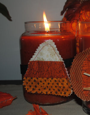A candy corn candle ring the is a Halloween craft, easy to sew, and handmade