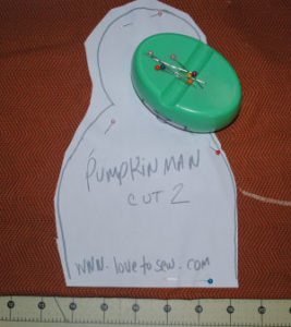 A pumpkinman craft perfect for Halloween that is easy to sew and handmade