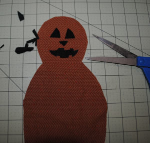 A Halloween Pumpkinman craft that is handmade and easy to sew with a free tutorial
