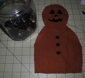 An easy to sew handmade Pumpkinman Halloween craft
