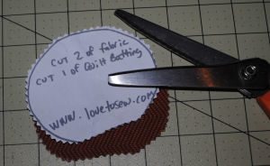 A Halloween decoration that is easy to sew and handmade, which features a pumpkin candle ring