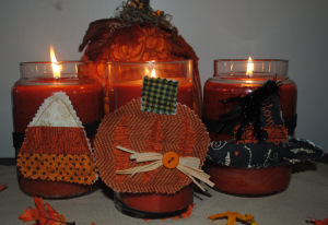 A finished product Halloween pumpkin candle ring that is handmade and easy to sew