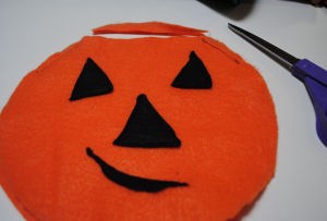 A handmade Halloween craft that is an easy to sew m & m American Girl doll costume