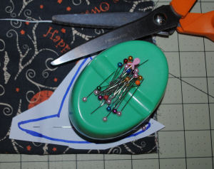 A Halloween decoration that is easy to sew and handmade, which features a witch hat candle ring