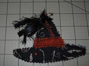 An easy to sew witch hat candle ring for Halloween that is handmade