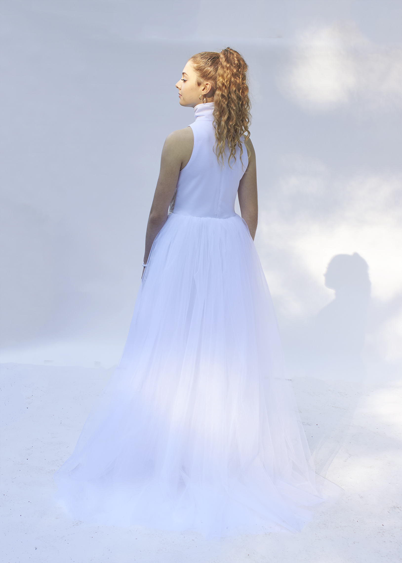 Back view of white tulle jumpsuit