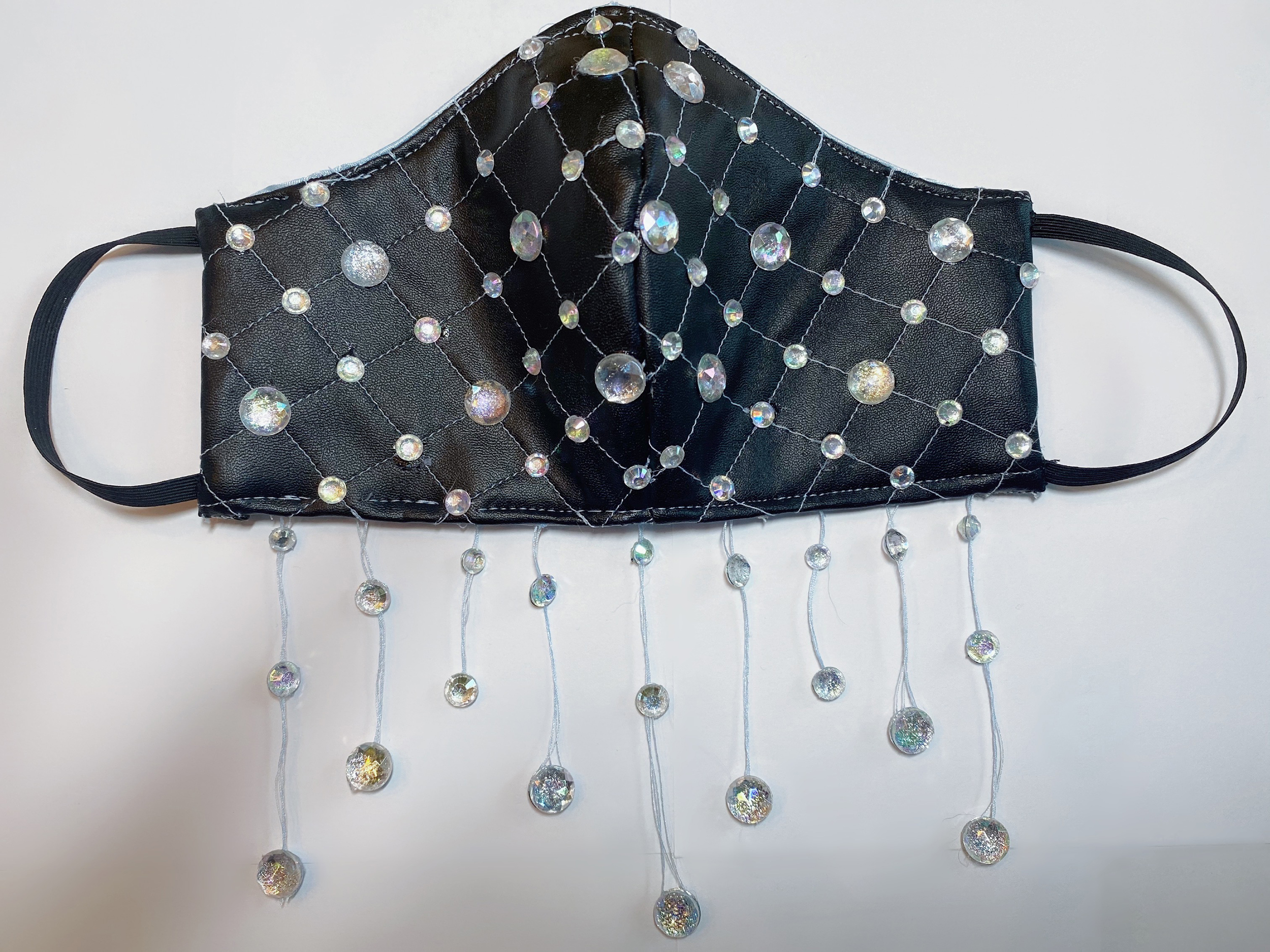 Leather face mask with quilted sequins