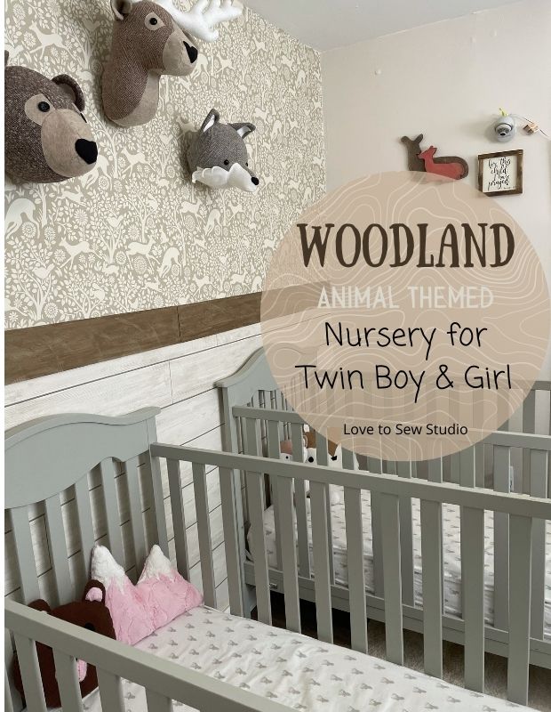 twin cribs in woodland themed nursery