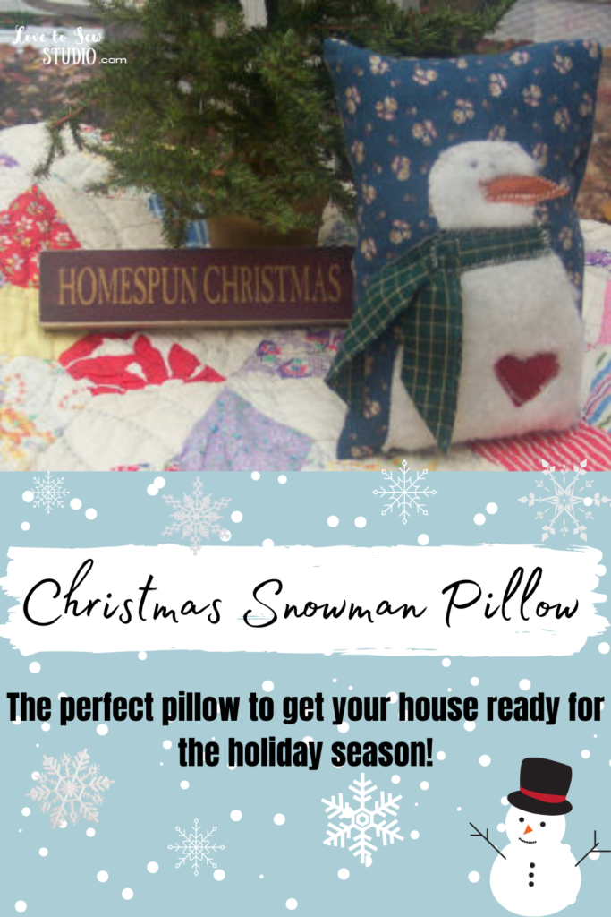 pillow with a snowman appliqué.