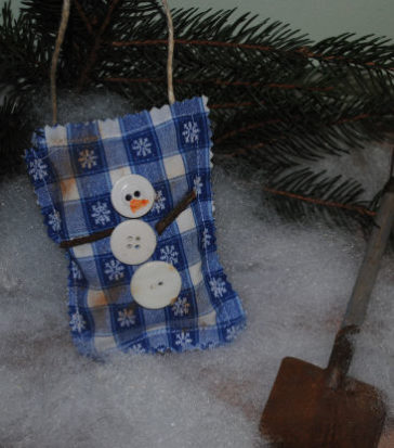fabric ornament with a button snowman