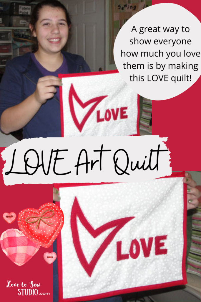 Red and white quilt with the love and a hear written on it