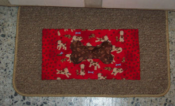dog fabric and a fabric dog bone turned into a place mat