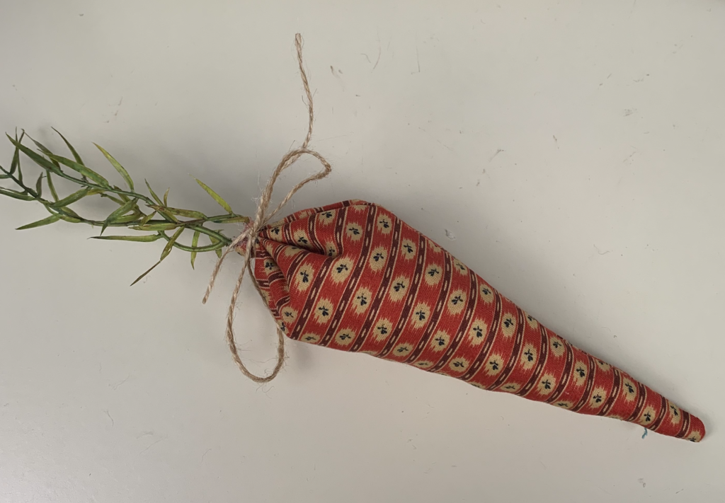 rustic orange fabric made into carrots to display