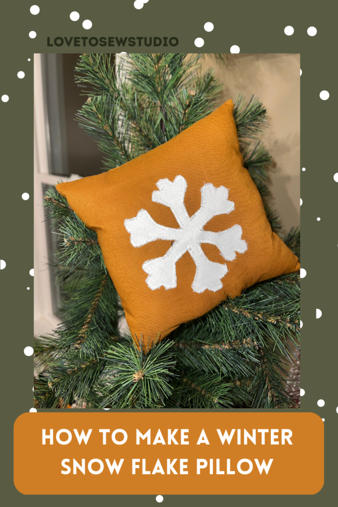 snowflake appliqué made into a pillow